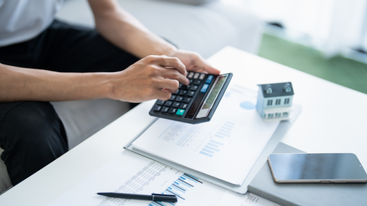 Calculating no money down land loan payments with property documents.